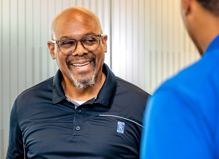 Two employees working in a factory.